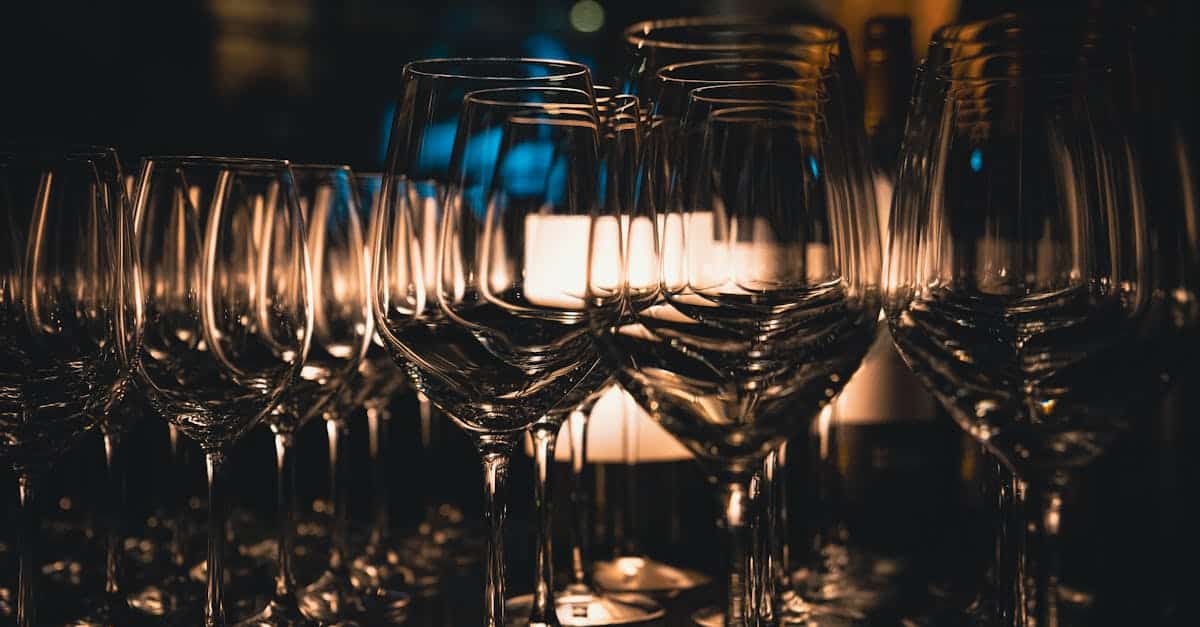 a row of wine glasses on a table 2